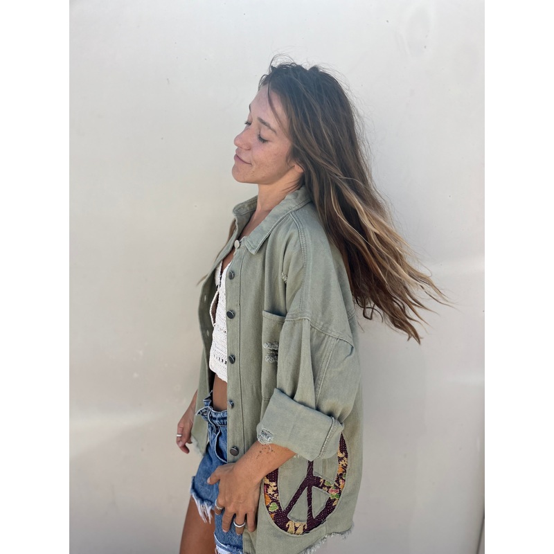 She is a Surfer Green Jacket